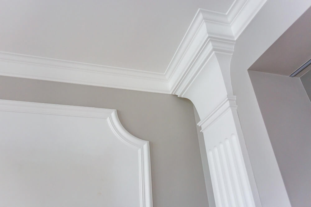 Interior painting of trims like baseboards, crown moldings, columns, wood accents, and more.
